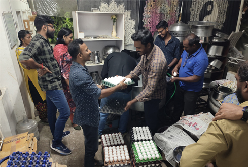 Volunteers preparing meals in Big Kitchen